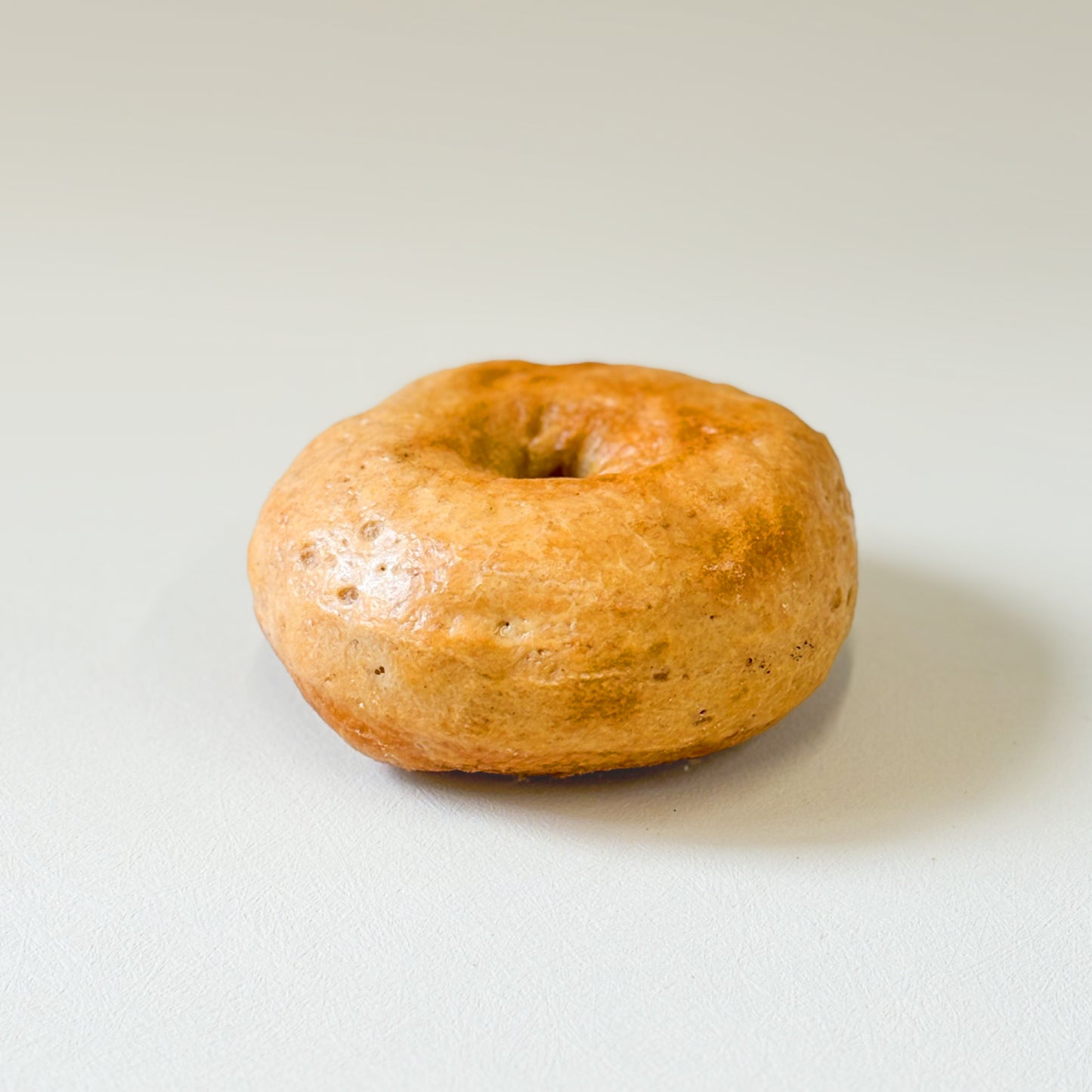 Gluten-free New York-style bagels from Happy Atelier Stockholm with a golden crust and soft center